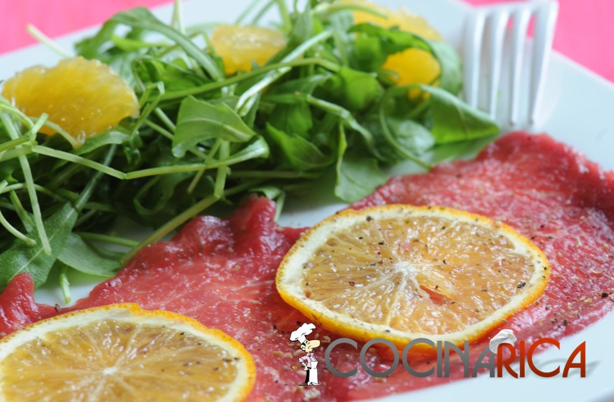 Carpaccio de buey con naranja