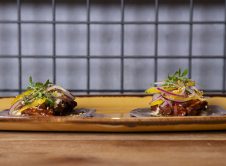Taco De Pulpo Con Mayo Katsuobushi Y Lima, Mini Ensalada De Cebolla Y Brotes De Cilantro, Cokima