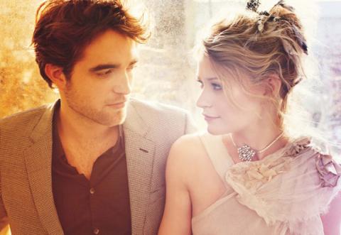 Robert Pattinson y Emilie de Ravin, radiantes en la revista Vogue