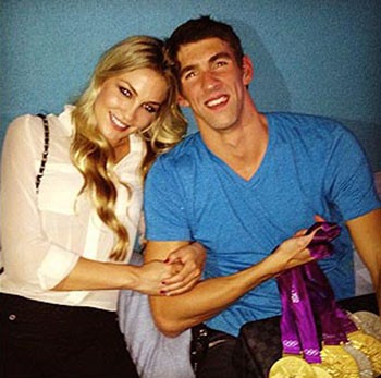 Michael Phelps sale con una aspirante modelo Megan Rossee